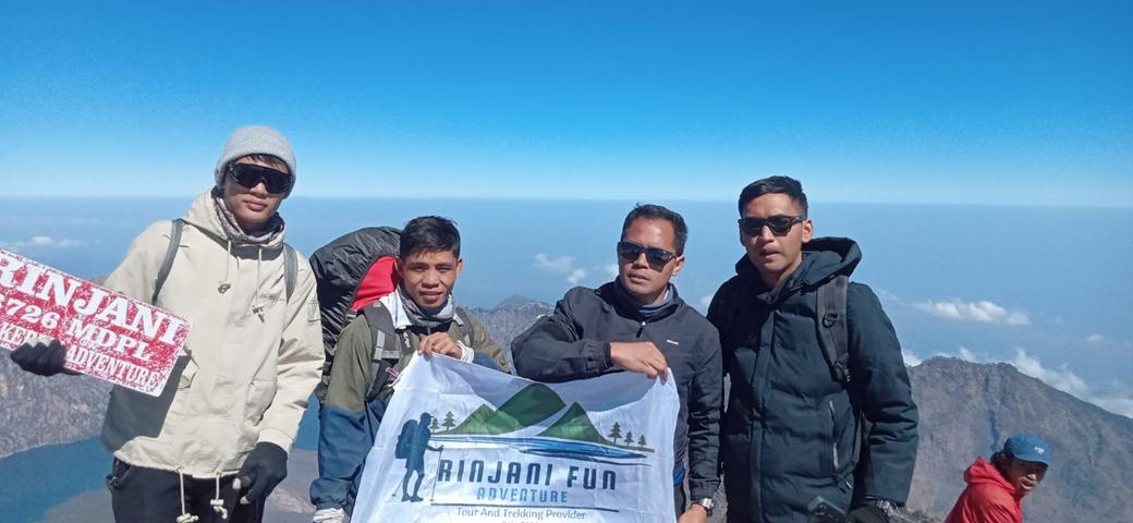 Rinjani Fun Adventure logo with a mountain and text.